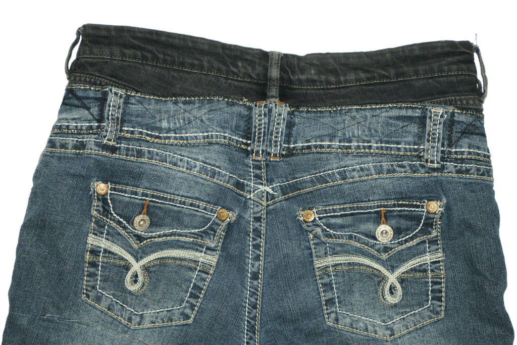 DOUBLE FLARED JEANS IN TRAILWASH DENIM
